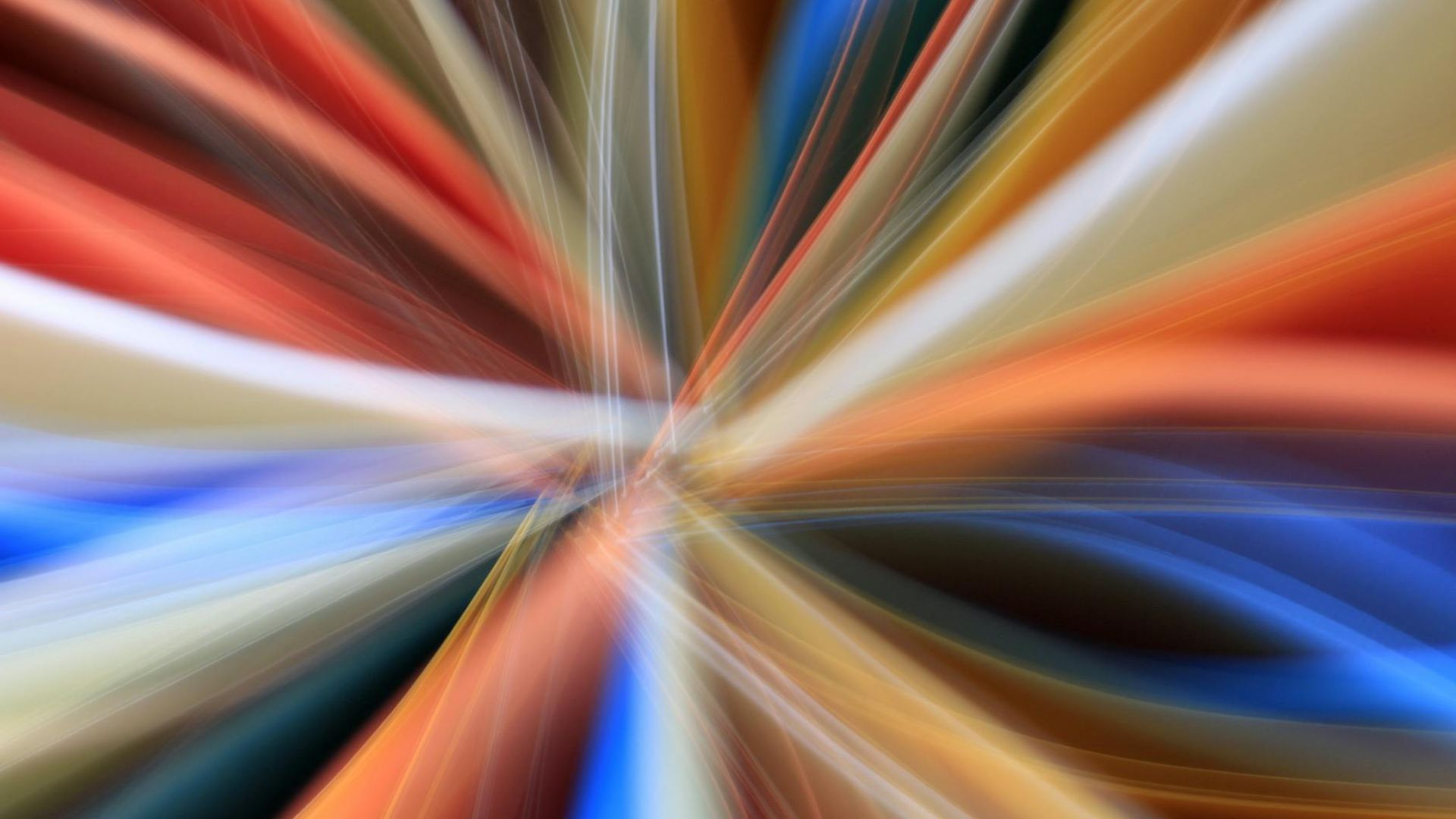 Abstract light patterns suggesting movement and energy.